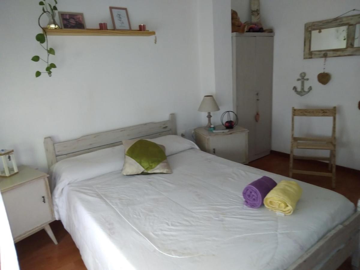 Quarto em Acomodações Particulares Mi Lugar En El Mundo *